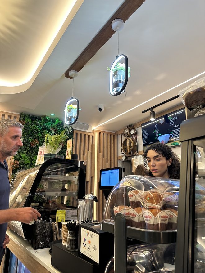 The service counter with the pastry case in front, cropped to the case.
